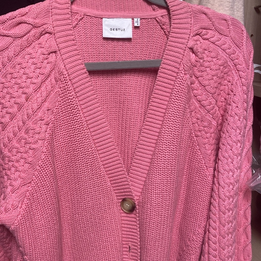 Stunning pink cardigan from designer from Europe and perfect condition worn once